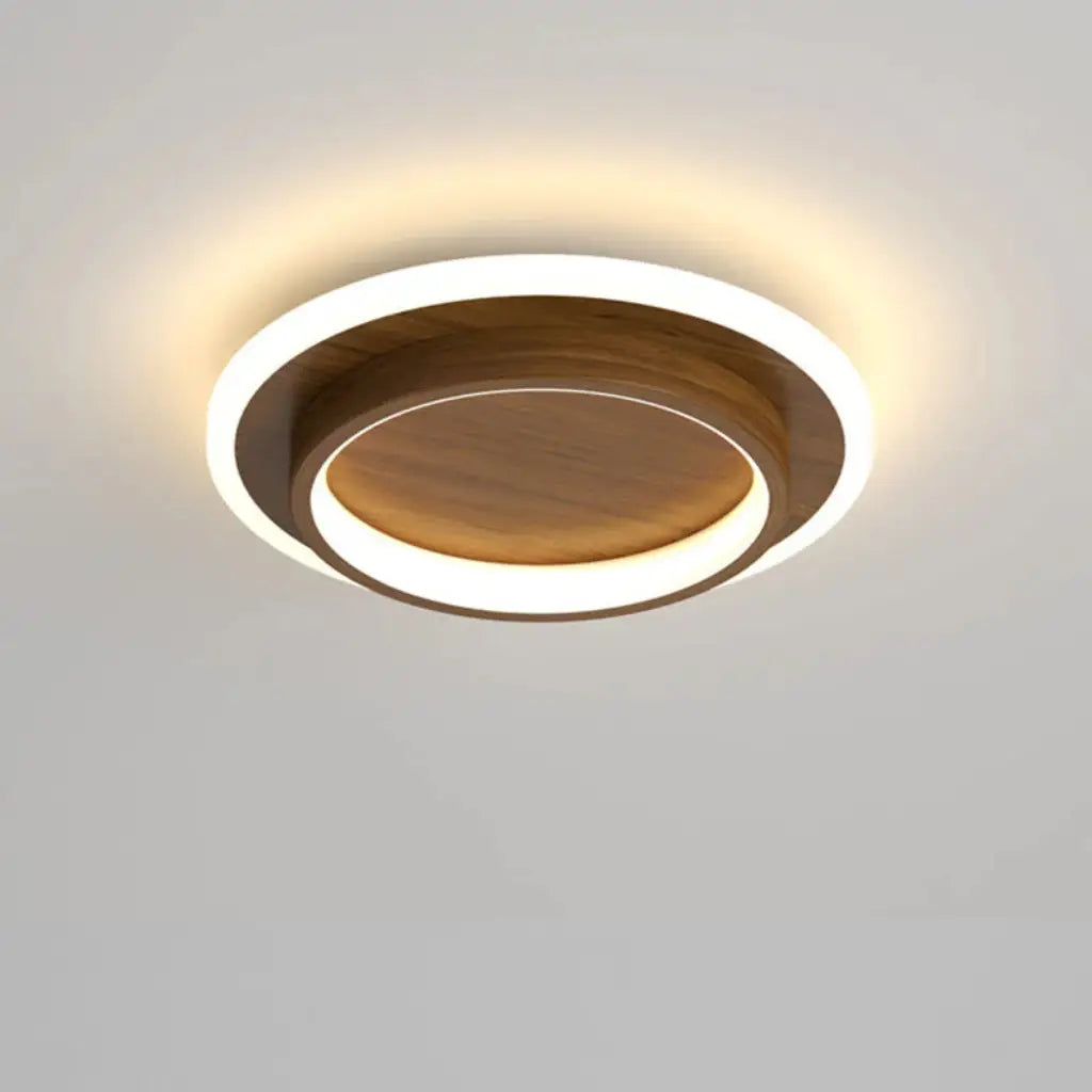 Plafoniera LED a conchiglia con anello luminoso e illuminazione a doppio strato, aderente al soffitto