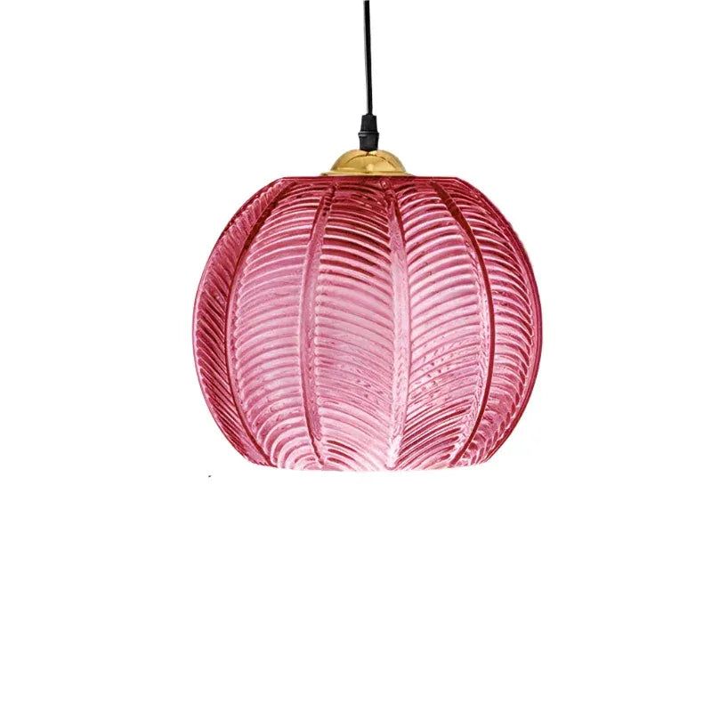 Pendant Light with Leaf-Pattern Glass and Soft Ambient Illumination