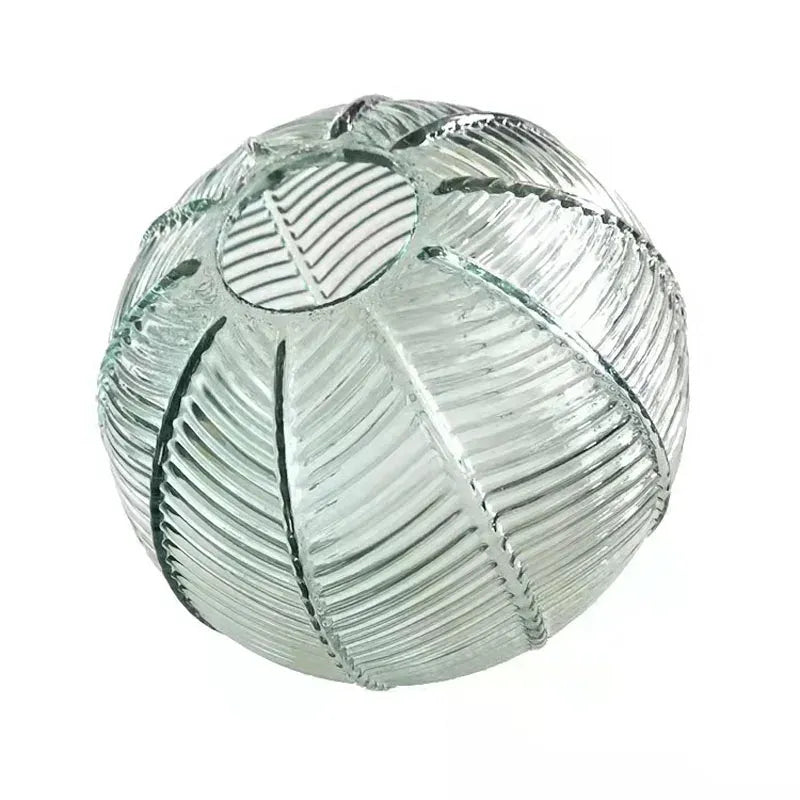 Pendant Light with Leaf-Pattern Glass and Soft Ambient Illumination