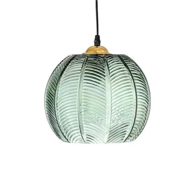 Pendant Light with Leaf-Pattern Glass and Soft Ambient Illumination