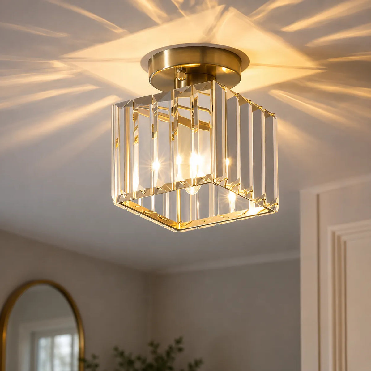 Plafonnier Lunara moderne semi-affleurant en laiton et cristal