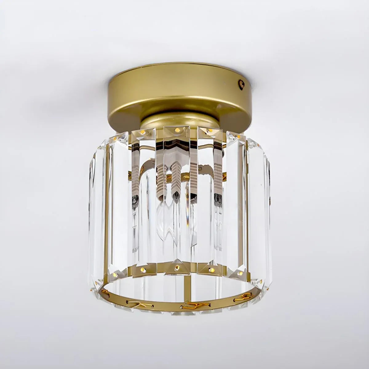 Plafonnier Lunara moderne semi-affleurant en laiton et cristal
