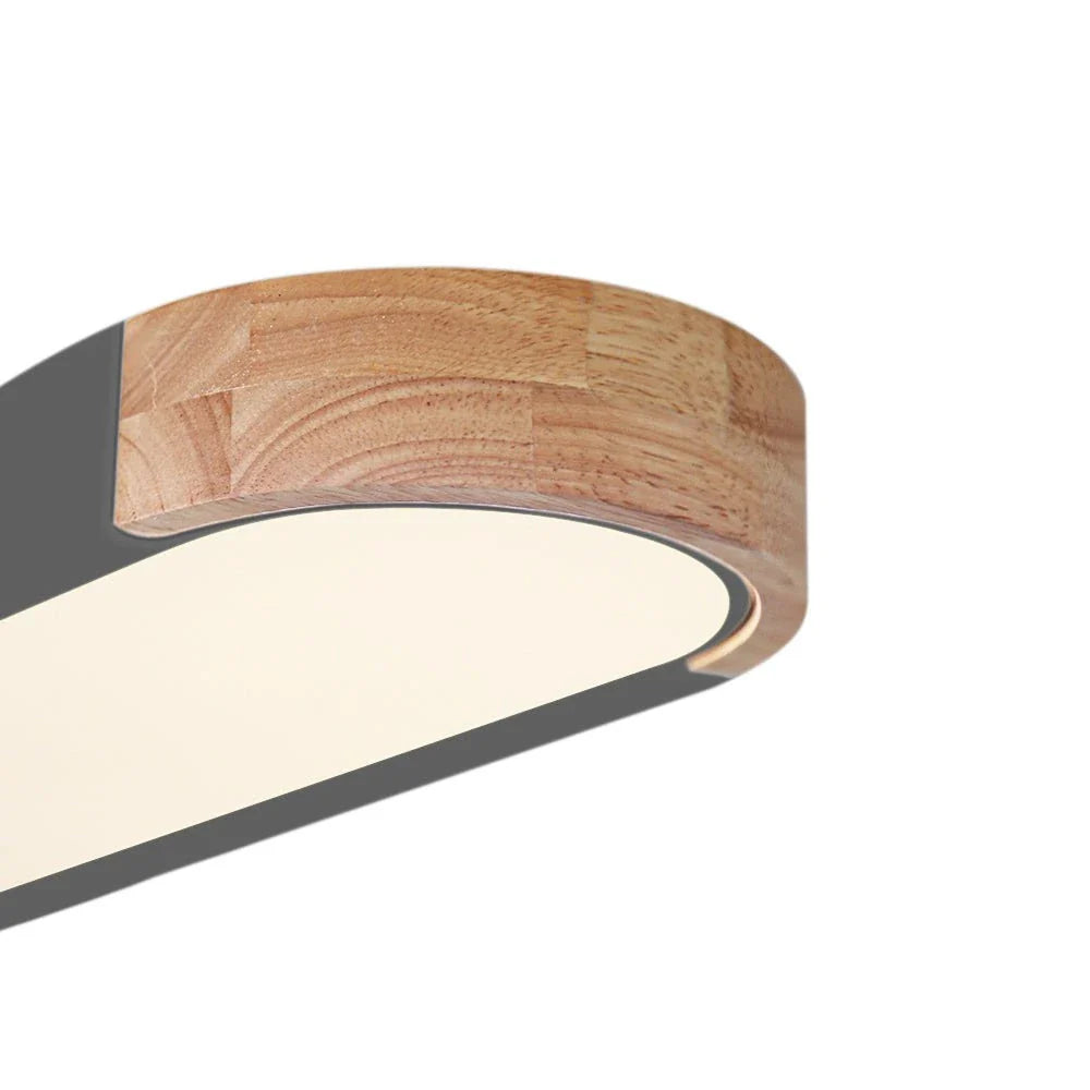 LED-Deckenleuchte mit ovalem Akzent aus Holz