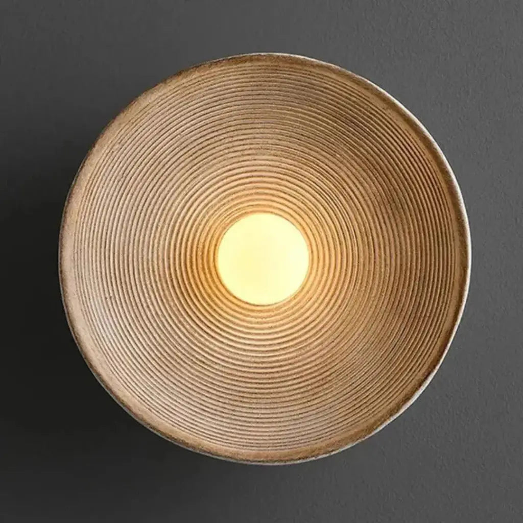 Wall Sconce Lamp with Concentric Ripple Resin Texture and Modern Ambient Lighting