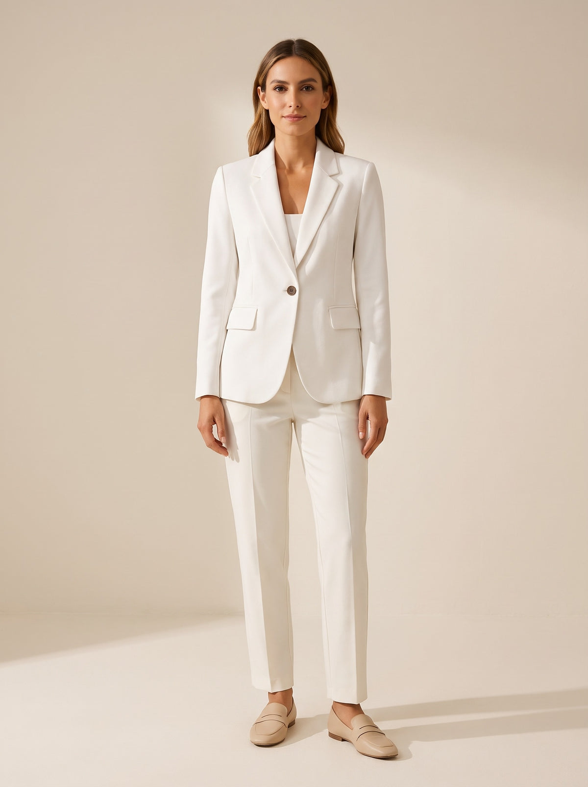 Le blazer ajusté à revers crantés