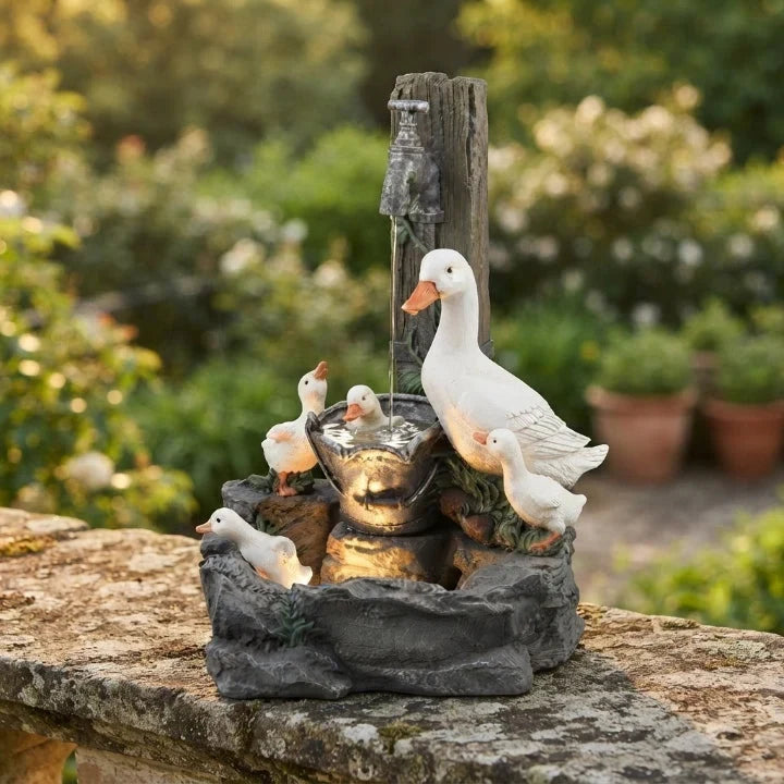 Water Fountain with Hand-Painted Animal Figure and LED Lighting Solar Tabletop Design - Image 1